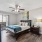 spacious bedroom with large sliding glass door for natural lighting